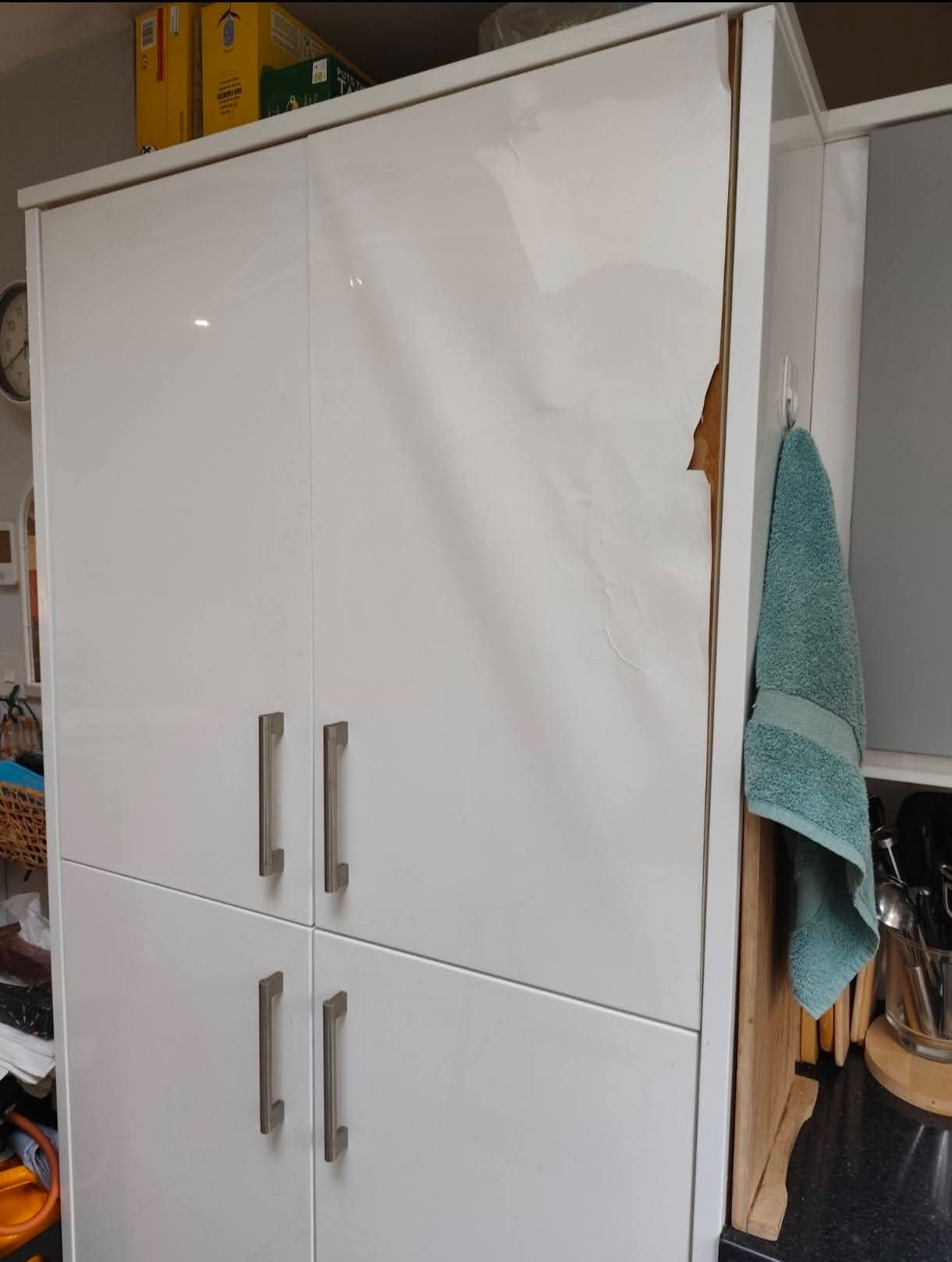 Damaged cabinet before wrap
